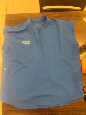 FIGS Kids Sleeveless Polo Top - Blue with Aya Healthcare Logo
